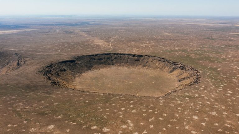 Meteor impact crater landscape used as an illustrative image