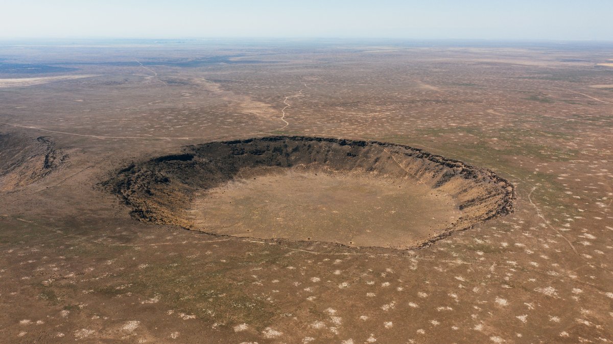 Meteor impact crater landscape used as an illustrative image