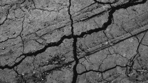 Cracked ground along a fault line