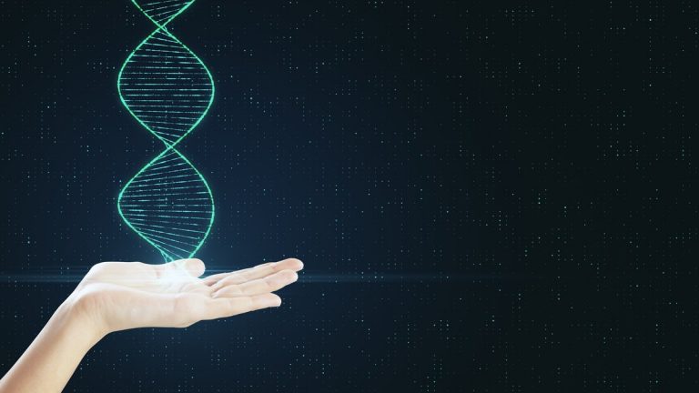 Genetic science and biotechnology concept with human hand with dna spiral at abstract background