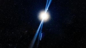 A radiant starburst illuminates the vast galaxy, casting blue rays through the star-filled night sky