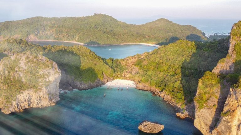 Forest and tropical sea, amazing aerial view from drone. Holiday concept