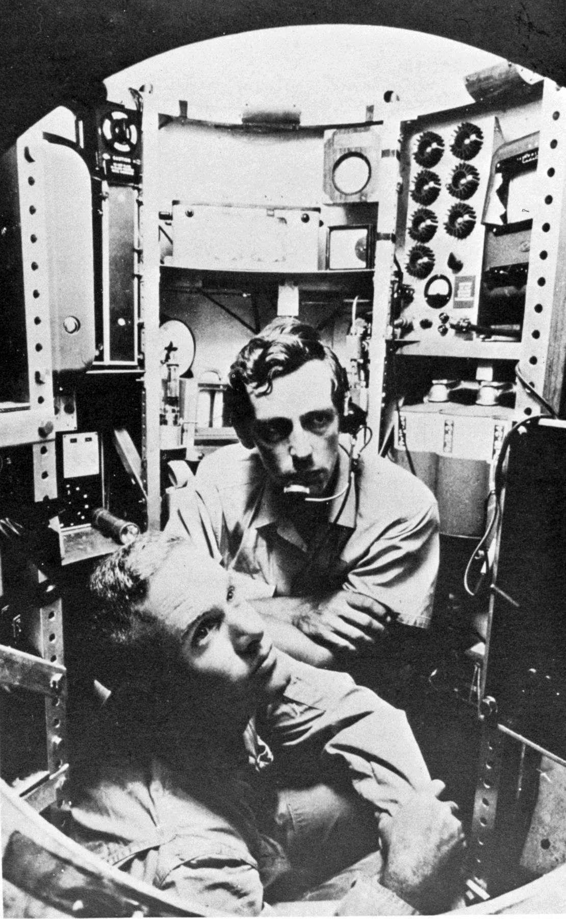 Don Walsh and Jacques Piccard inside the cramped pressure sphere of bathyscaphe Trieste in 1960