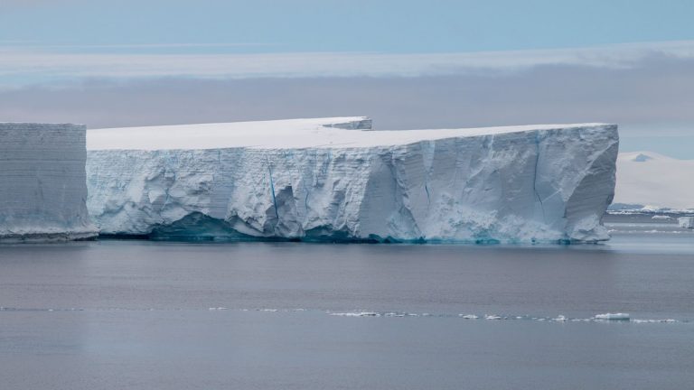 Massive iceberg floating in Antarctic waters