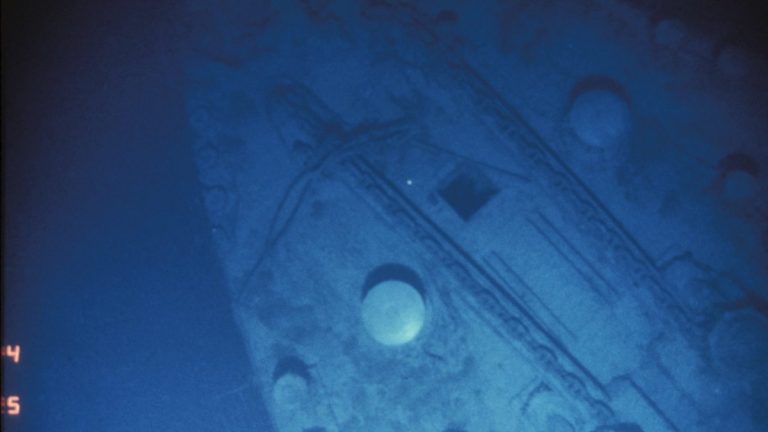 Port side of the Titanic bow, the two capstans and the port and starboard anchor chains are visible