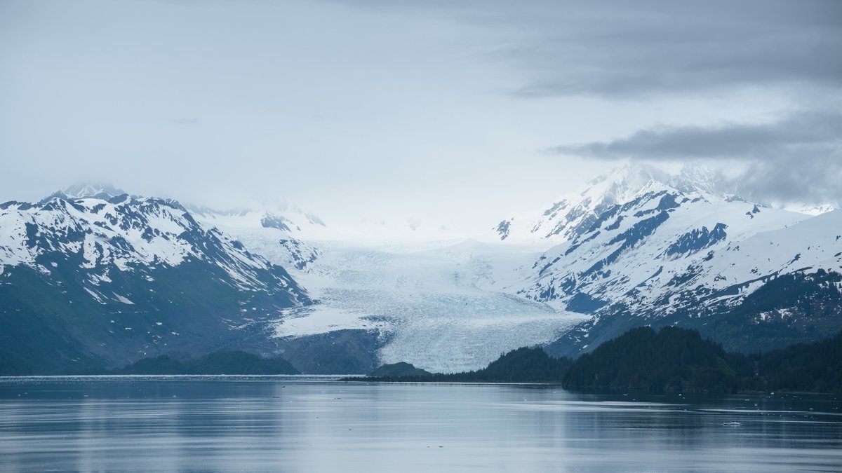 Mendenhall Glacier and calm water of Alaska's fjords