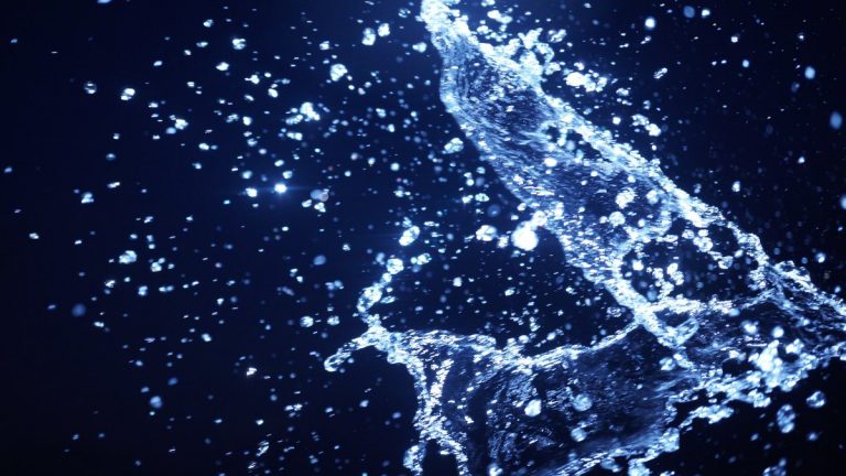 Water splash on dark blue like deep ocean background for abstract water concept
