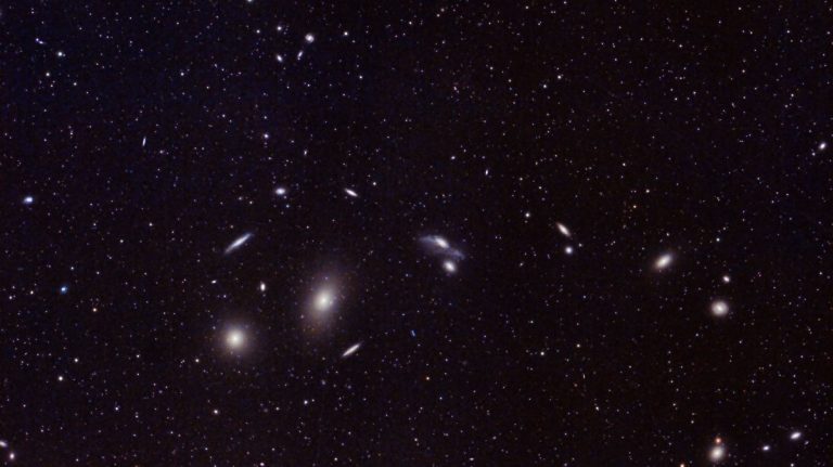 Distant galaxies and star clusters in deep space