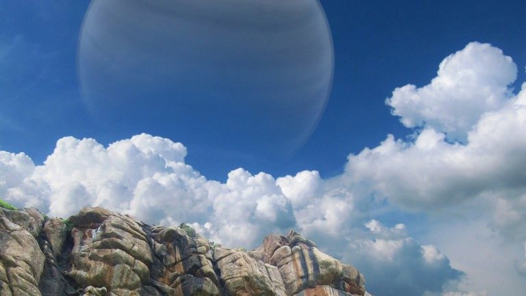 Artist-style view of a gas giant exoplanet and moon in space