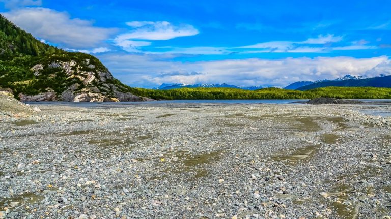 Panorama of an Alaskan river bank on glacier sediment deposits