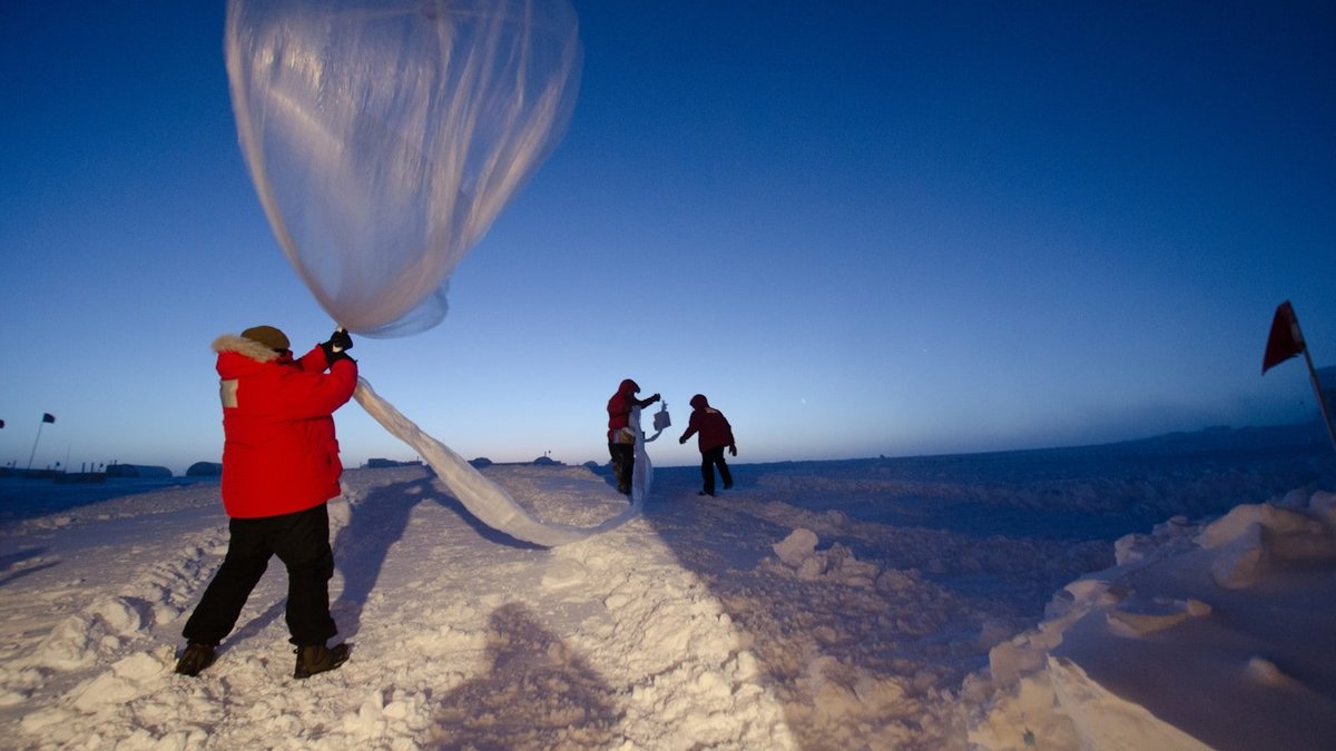A scientific weather balloon being prepared for launch