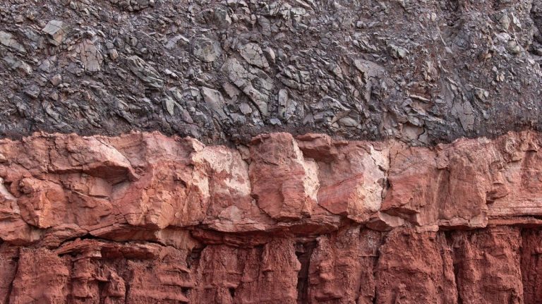 Layered rock and sediment textures representing ocean drilling cores