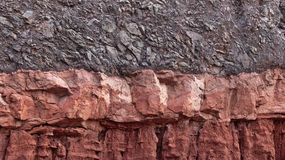Layered rock and sediment textures representing ocean drilling cores