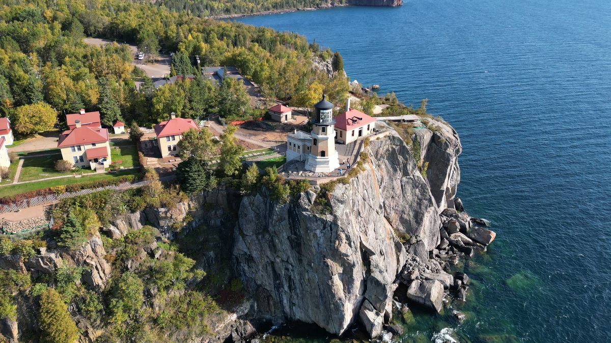 Split Rock Lighthouse above Lake Superior's rocky shoreline
