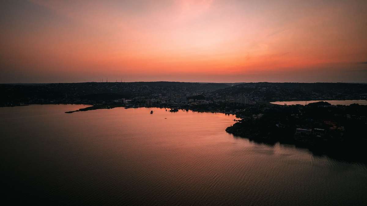A breathtaking sunset over Lake Victoria in Mwanza, Tanzania, showcasing tranquil waters and vibrant skies