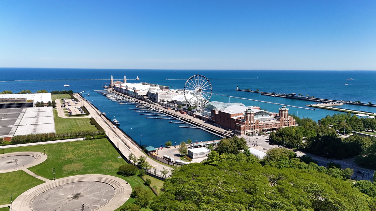 Stunning aerial shot of Chicago's Navy Pier showcasing the Ferris wheel and Lake Michigan's shoreline
