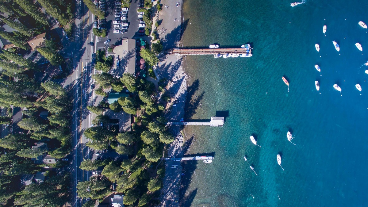 Lake Tahoe shoreline, docks and boats seen from above