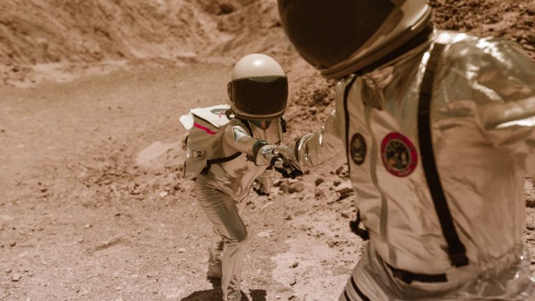 Astronaut crew cooperating in an isolated habitat