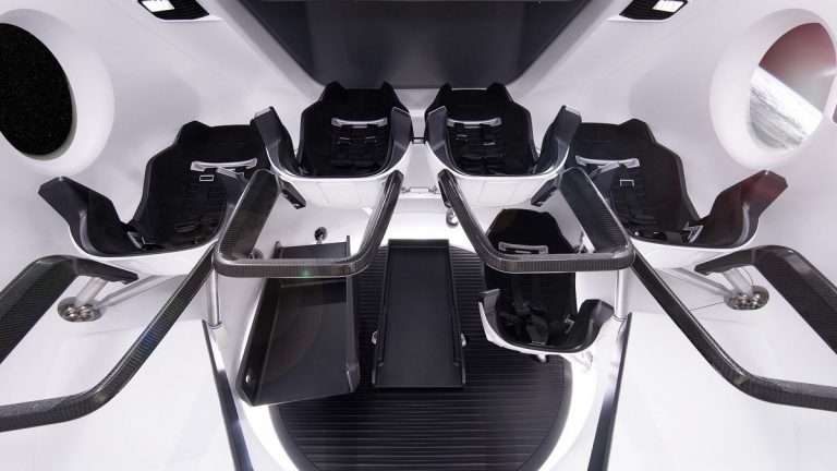 Seats and controls inside a modern spacecraft simulator