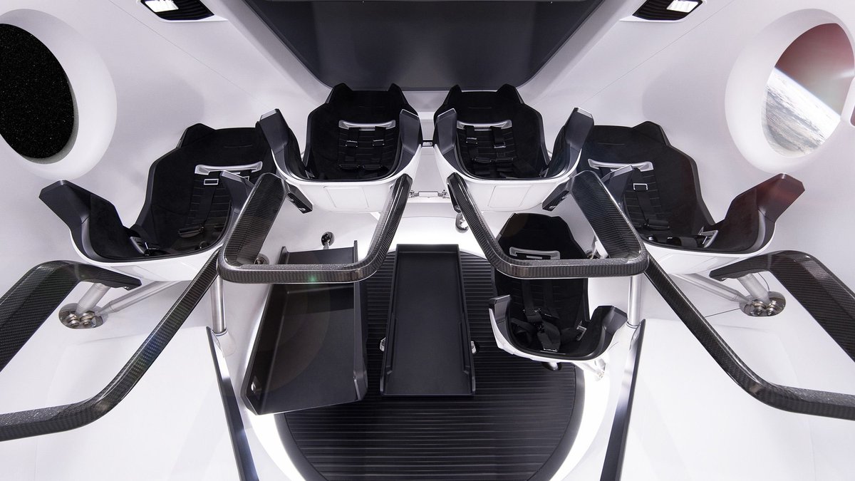 Seats and controls inside a modern spacecraft simulator