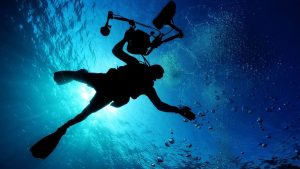 Diver underwater during a deep-ocean dive