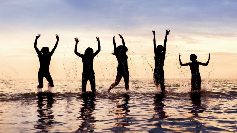 Group of open water swimmers in the sea