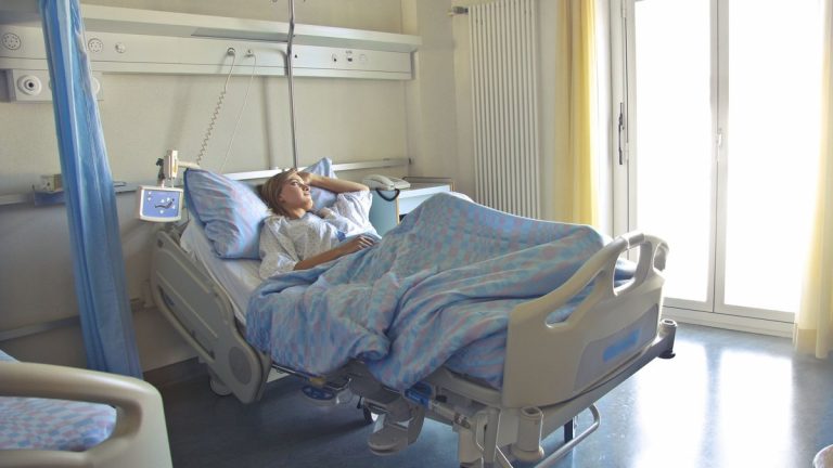 A participant resting in a hospital bed during a prolonged bed-rest setting
