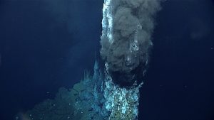 A black smoker hydrothermal vent releasing mineral-rich fluid in the deep ocean