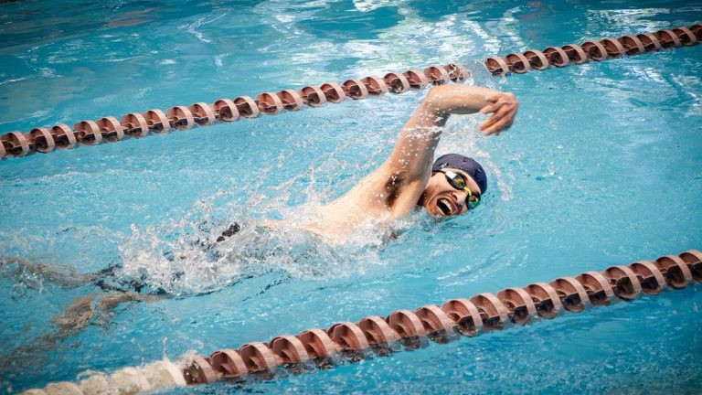 Swimmer immersed in pool water