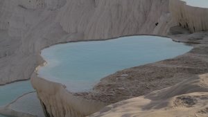 Breathtaking view of Pamukkale's travertine terraces with mineral-rich thermal waters