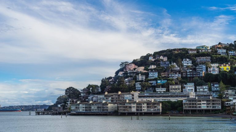 Stunning view of Sausalito's hillside homes with ocean view, capturing urban coastal charm
