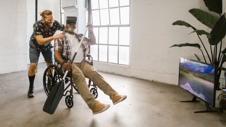 Two men enjoy virtual reality gaming indoors, emphasizing fun and accessibility