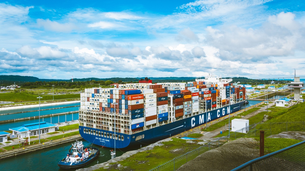 A cargo ship moving through the Panama Canal